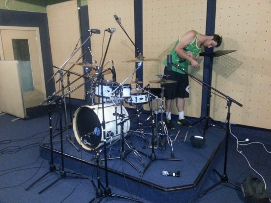 Drummer preparing to record his drum parts for an album in Belmore, Sydney